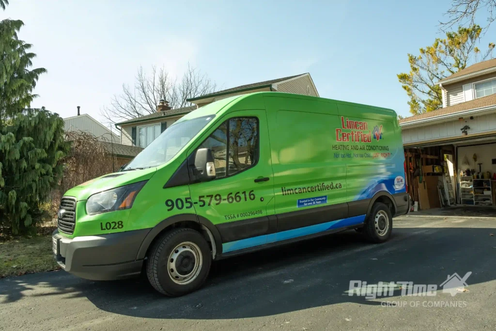 Limcan Certified green service van parked in a residential driveway at the start of winter.